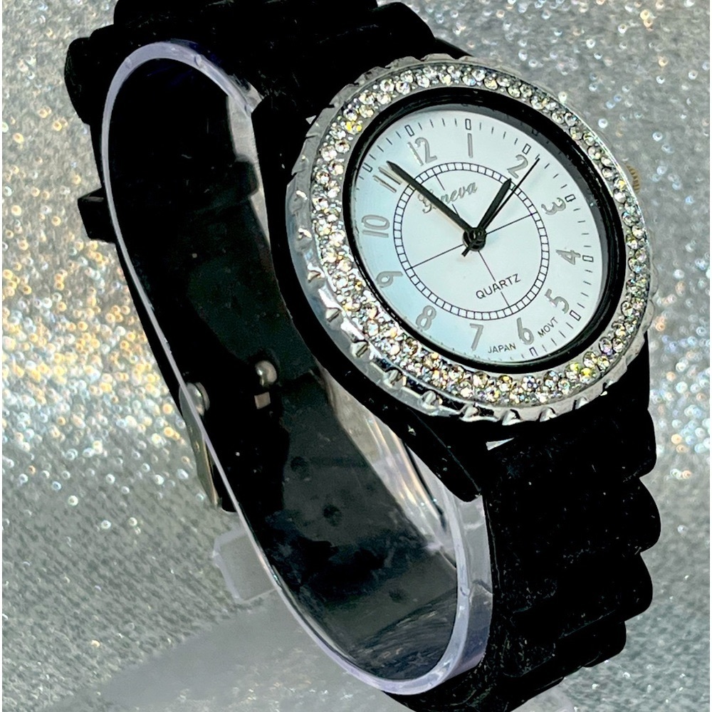 GENEVA! Very rugged. Yeah, elegant watch! Silicone band with gemstone bezel.
